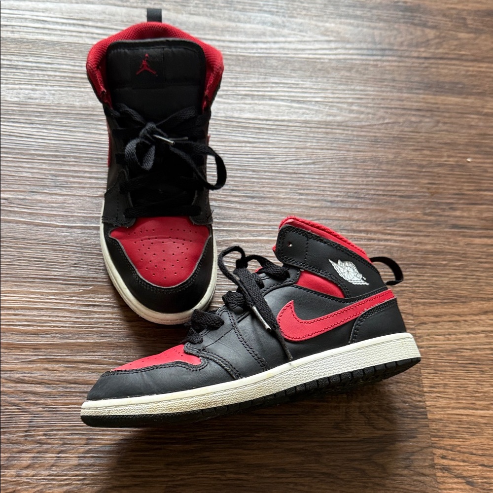 Red and black Jordan Nikes size 3Y
